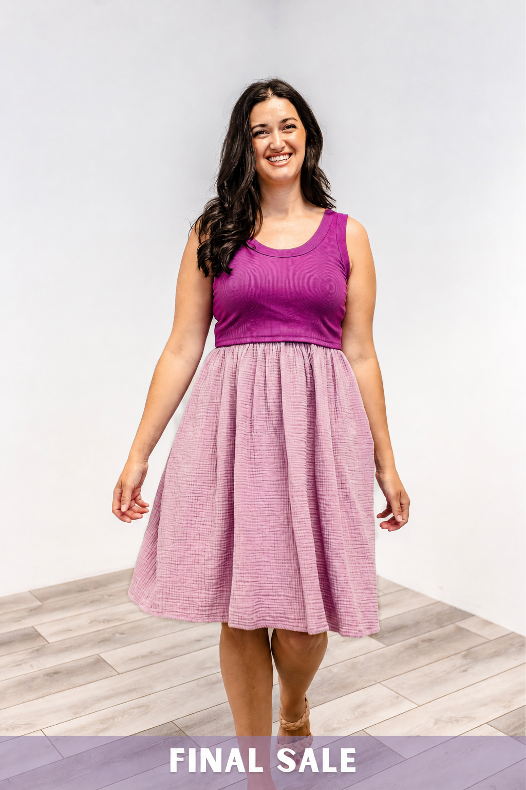 Woman wearing a Latched Mama Breezy Cotton Nursing Dress in Purple and Pink.