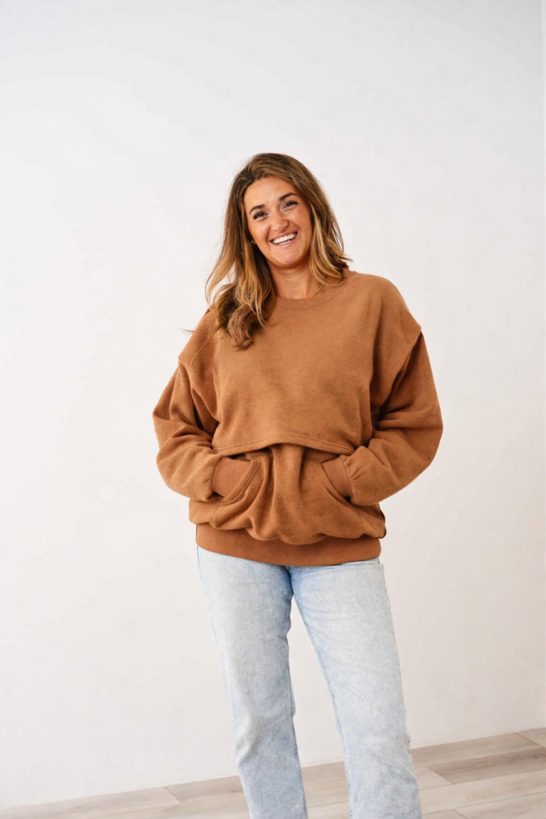 Full length view of the Toffee Latched Mama Snuggle Up Nursing Pullover on a white background