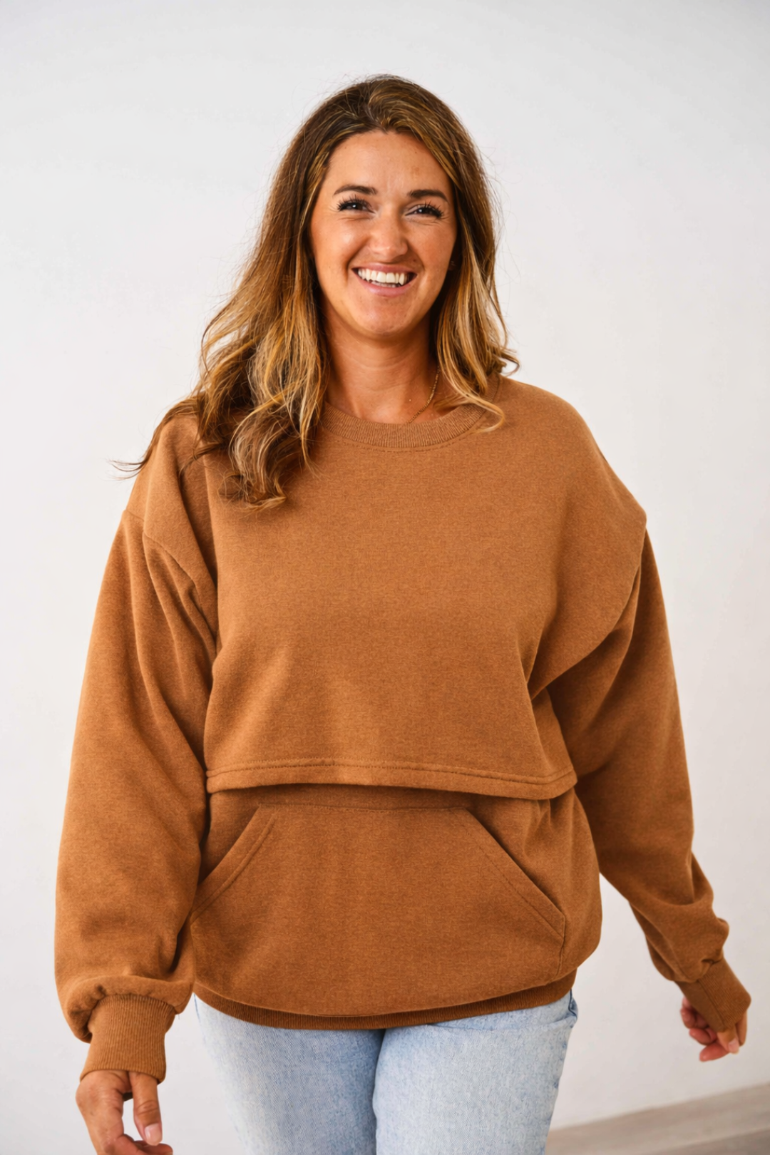 Woman wearing a toffee Latched Mama 635 Nursing Snuggle Up Pullover