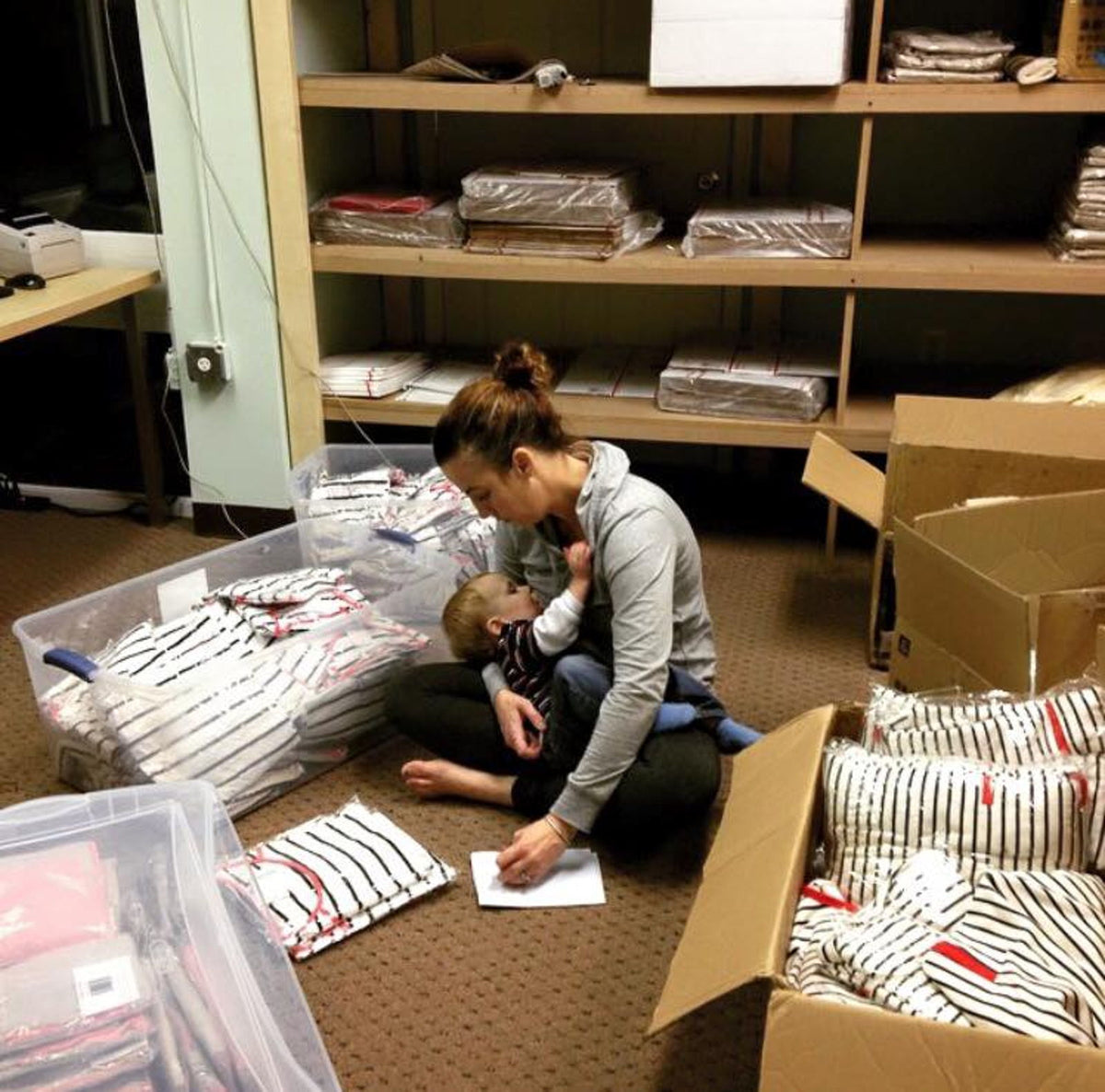 Orders being packed by hand in Latched Mama’s early warehouse days