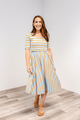 Woman wearing a saltwater stripes classic cotton nursing dress by latched mama.